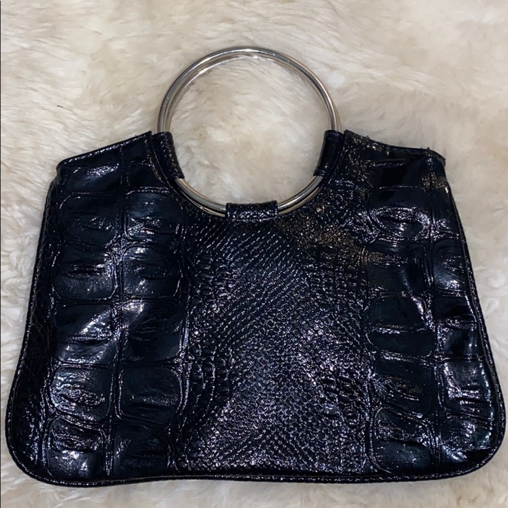 Black snakeskin handbag with silver metal hoops